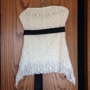 Cream colored shark bite side shirt